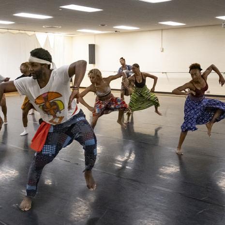 students participating in an African dance class.